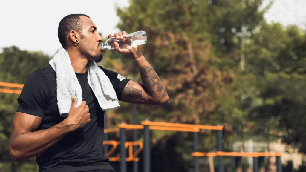 Image-of-a-man-hydrating-during-training.