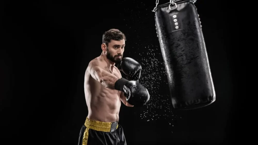 Image-of-a-man-practicing-punching-with-a-sandbag