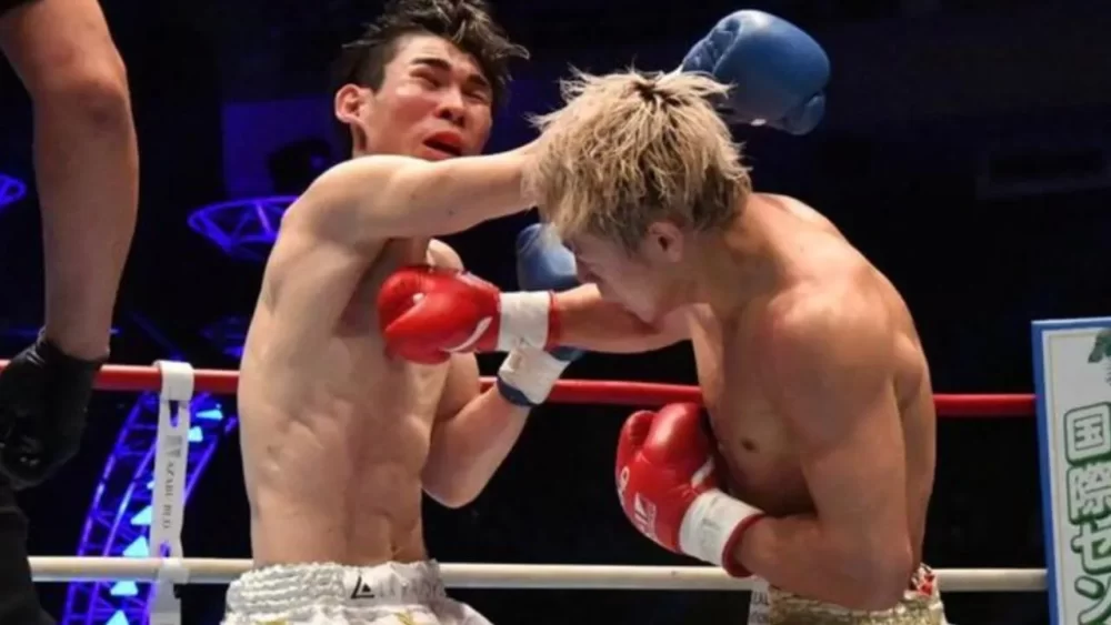 Image-of-Takeru-hitting-a-right-hook-in-a-match