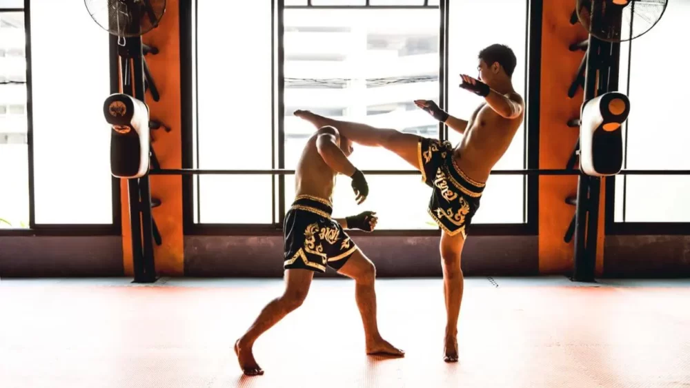 Image-of-two-men-practicing-kickboxing-together.