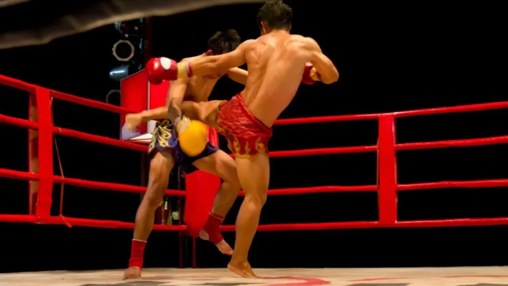 Image-of-a-man-doing-a-left-middle-kick-switch-in-a-kickboxing-match