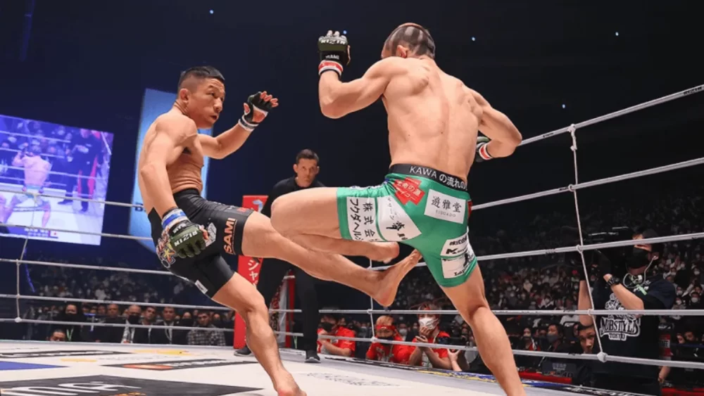 Image-of-Kyouji-Horiguchi-kicking-a-calf-kick-in-a-martial-arts-matc