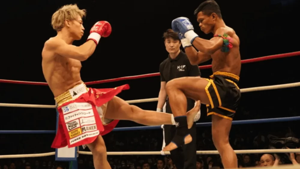 Image-of-Takezo-kicking-a-left-low-kick-in-a-match