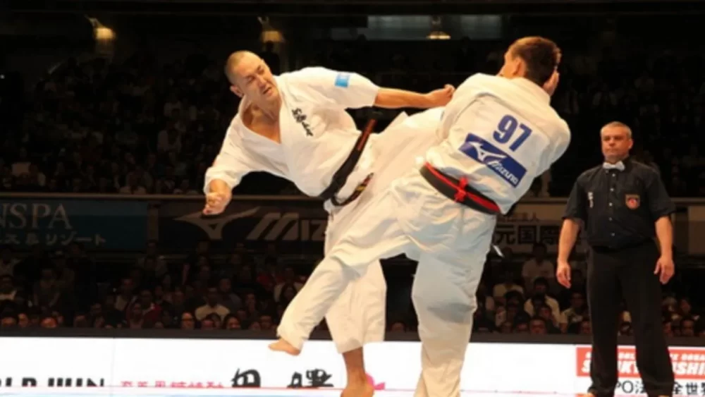 Image-of-Tsukamoto-doing-a-body-spinning-rotation-kick-in-a-karate-match.