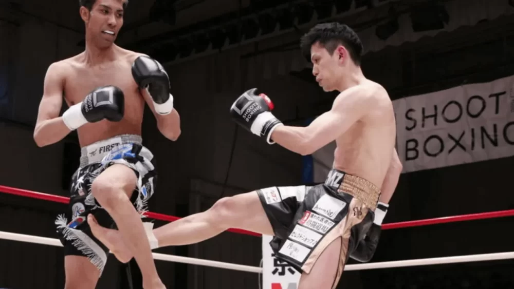 
Image-of-a-man-doing-an-in-low-kick-in-a-kickboxing-match