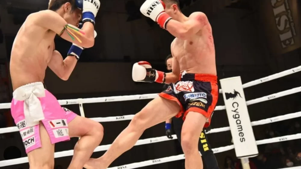 Image-of-a-man-kicking-a-calf-in-a-martial-arts-match